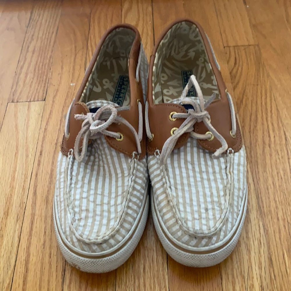 Sperry boating shoes. White with brown stripes
